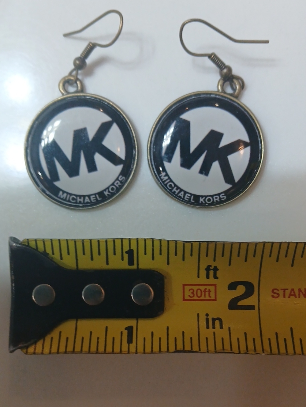 Michael Kors round logo dangle earrings feature the brand's iconic "MK" monogram - Picture 7 of 8